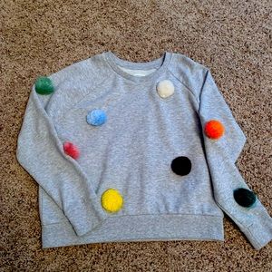 Gymboree Pom Pom Sweatshirt, soft material with cute pom-pom balls. Size L/10-12